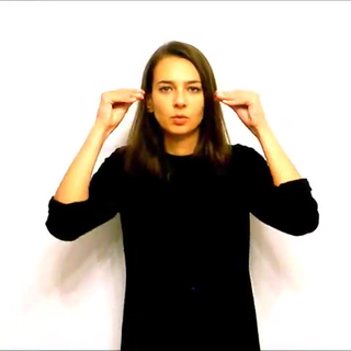 Znak „wieczór" w polskim języku migowym (PJM)